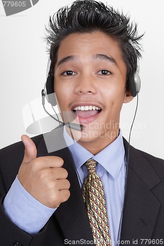 Image of Call center agent thumbs up portrait