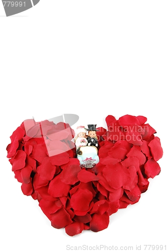 Image of Red heart made of rose petals for Valentine's Day