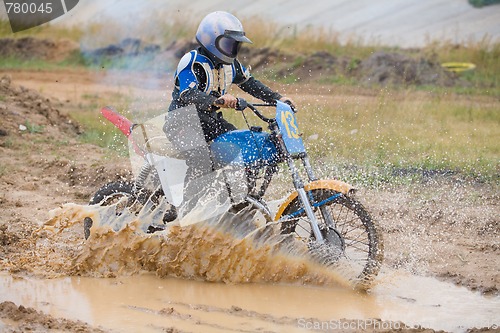 Image of Young moto cross rider