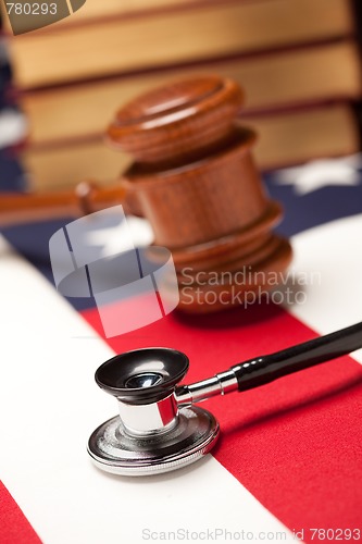 Image of Gavel, Stethoscope and Books on Flag