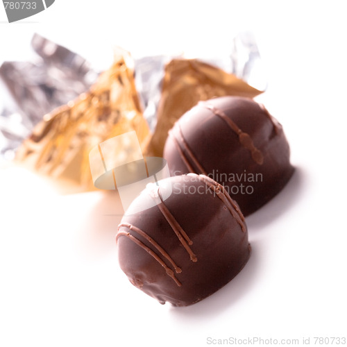 Image of two foil opened sweets