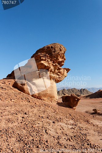 Image of Scenic orange rock in shape of mushroom in stone desert