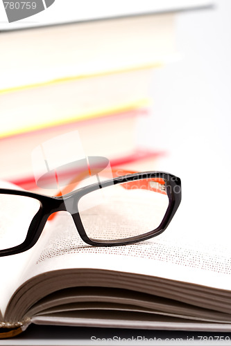 Image of books and glasses