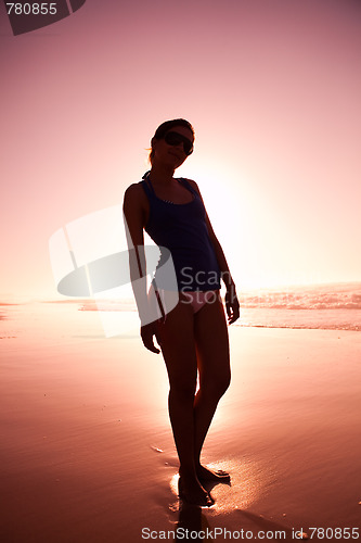 Image of Woman silhouette on the beach