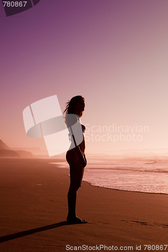 Image of Woman silhouette on the beach