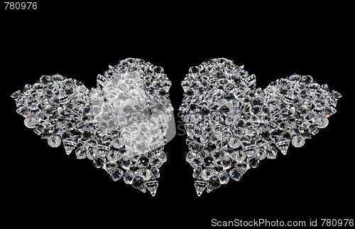Image of two hearts of diamonds on black