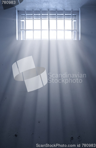 Image of cold prison cell with sunshine through window