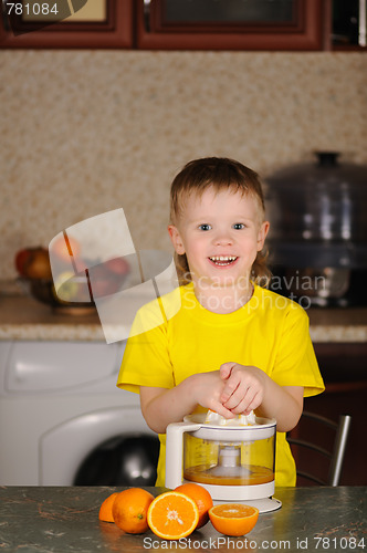 Image of The child to wring out juice