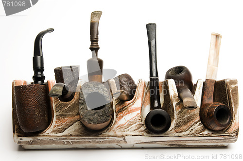 Image of pipe collection on modern pipe rack 