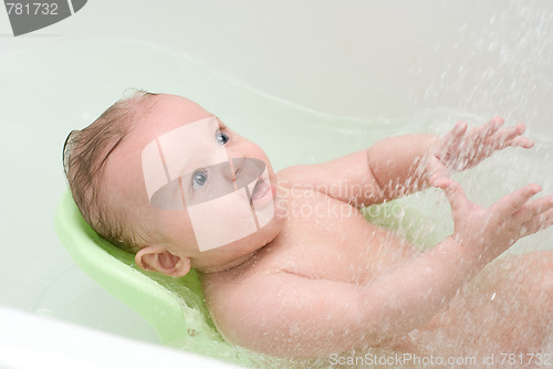 Image of washing baby