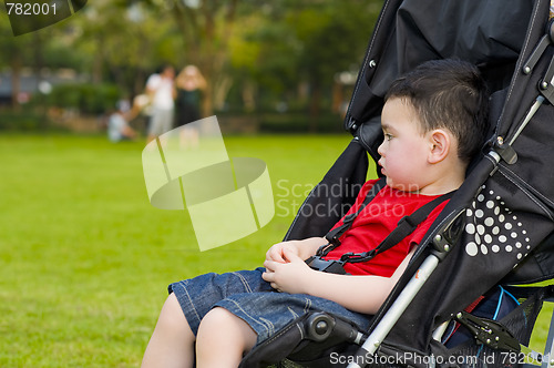 Image of boy in baby buggy