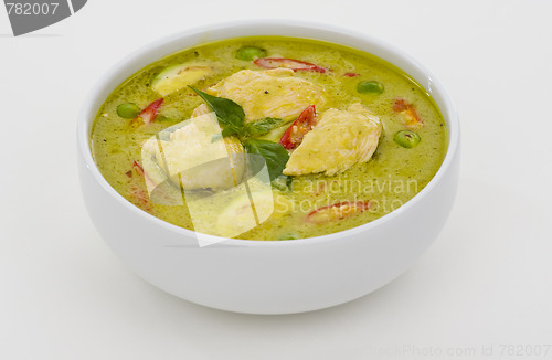 Image of green curry in a white bowl