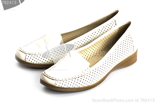 Image of pair of white shoes