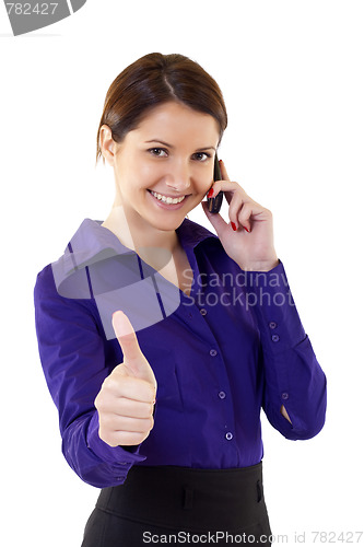 Image of Businesswoman talking on cell