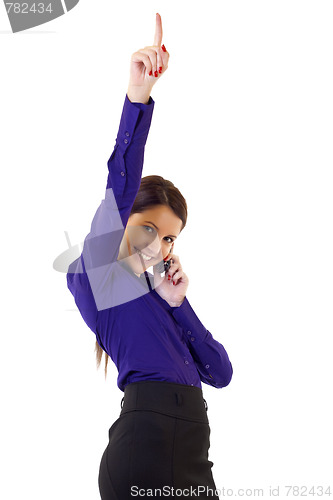 Image of businesswoman on the phone winning