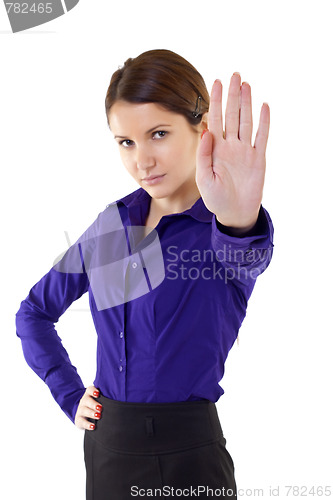 Image of Serious businesswoman making stop sign