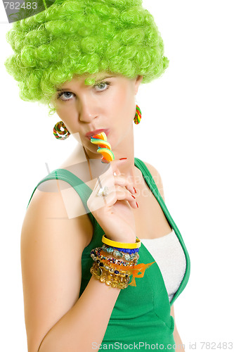 Image of beautiful woman with lollipop