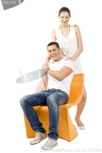 Image of picture of a man and woman on chair