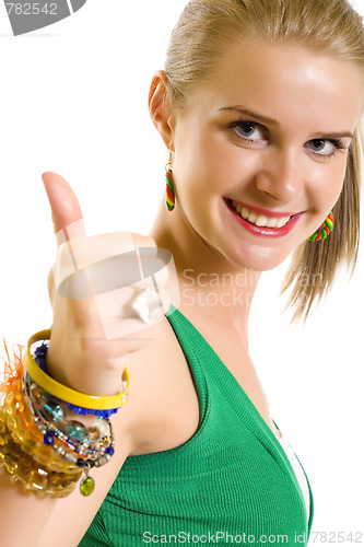 Image of Casual woman smiling with her thumbs up