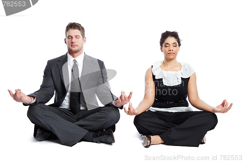 Image of Meditating business people
