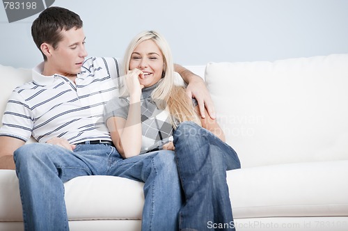 Image of Affectionate Couple Relaxing on Couch