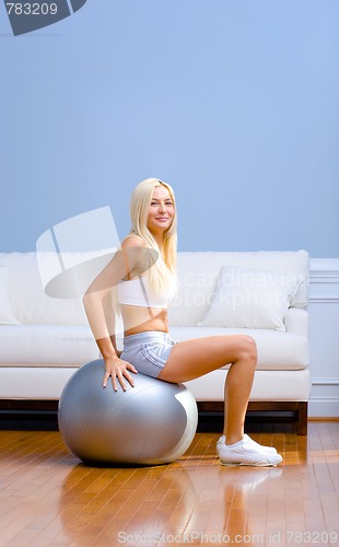 Image of Young Woman Exercising