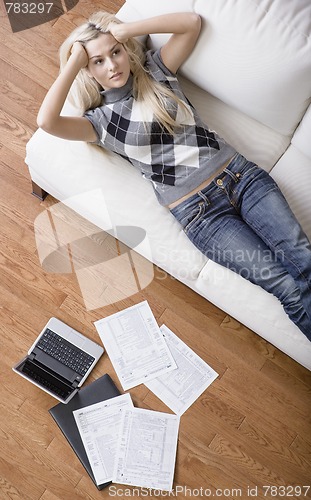 Image of Young Woman Doing Taxes