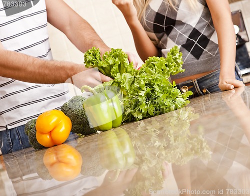 Image of Young Couple with Vegetables