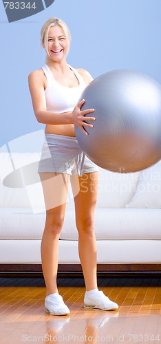 Image of Young Woman Exercising