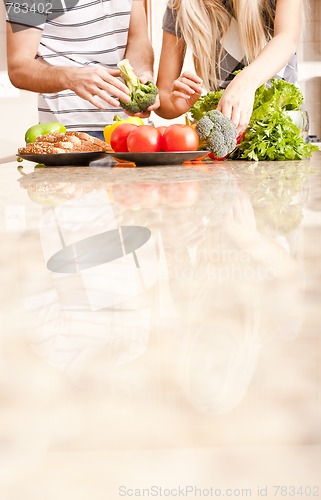 Image of Young Couple with Vegetables