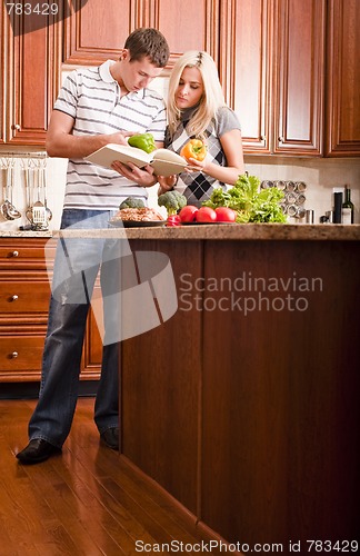 Image of Young Couple Cooking
