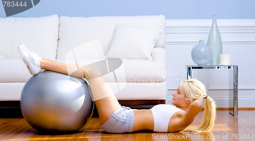 Image of Young Woman Exercising