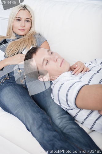 Image of Serene Couple Relaxing Together on Couch