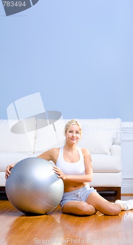 Image of Young Woman with Exercise Ball