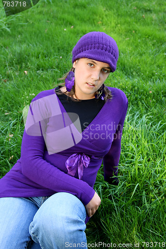 Image of  beautiful woman in an autumn park 