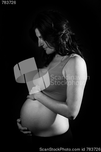 Image of beautiful pregnant woman expecting a baby girl