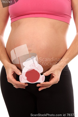 Image of beautiful pregnant woman expecting a baby girl