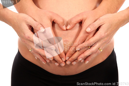 Image of beautiful pregnant woman expecting a baby girl