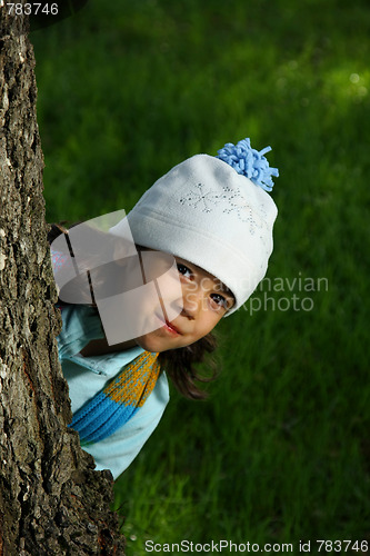 Image of Cute girl in autumn park