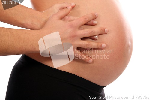 Image of beautiful pregnant woman expecting a baby girl