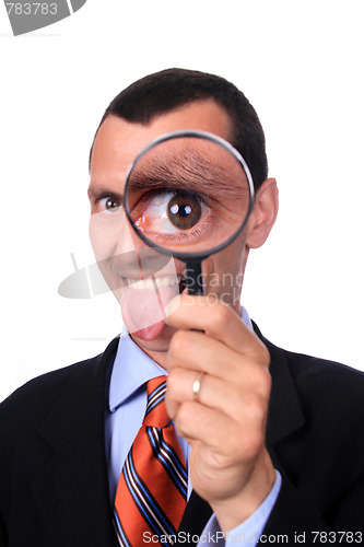 Image of businessman with magnifying glass