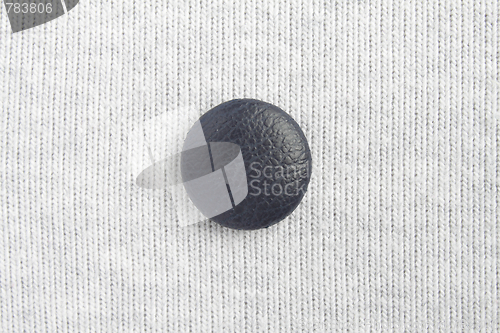 Image of Button on cloth