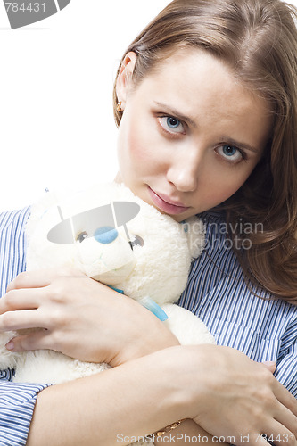 Image of Sad woman with teddy bear 
