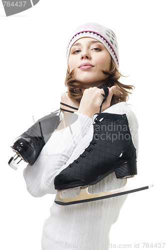 Image of Positive woman hold ice skates