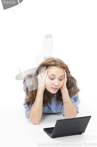 Image of Sad woman with laptop