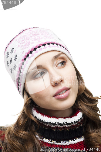 Image of Woman in winter cap interested