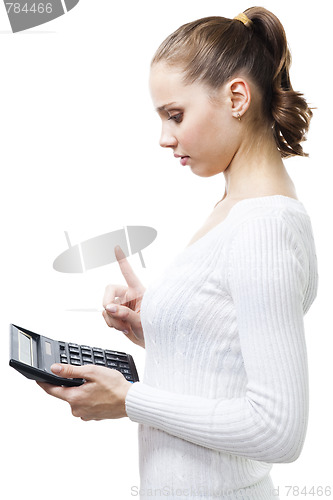 Image of Clever woman with calculator thinking