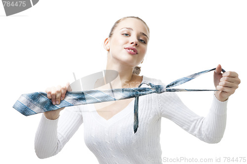 Image of Happy woman in business with men's tie