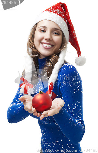 Image of Woman in New year costume give red ball
