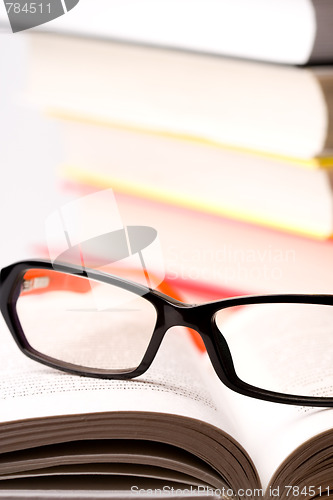 Image of books and glasses 